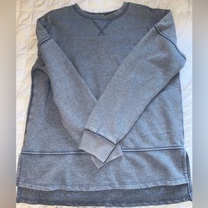 Long sleeve, a little longer in the back